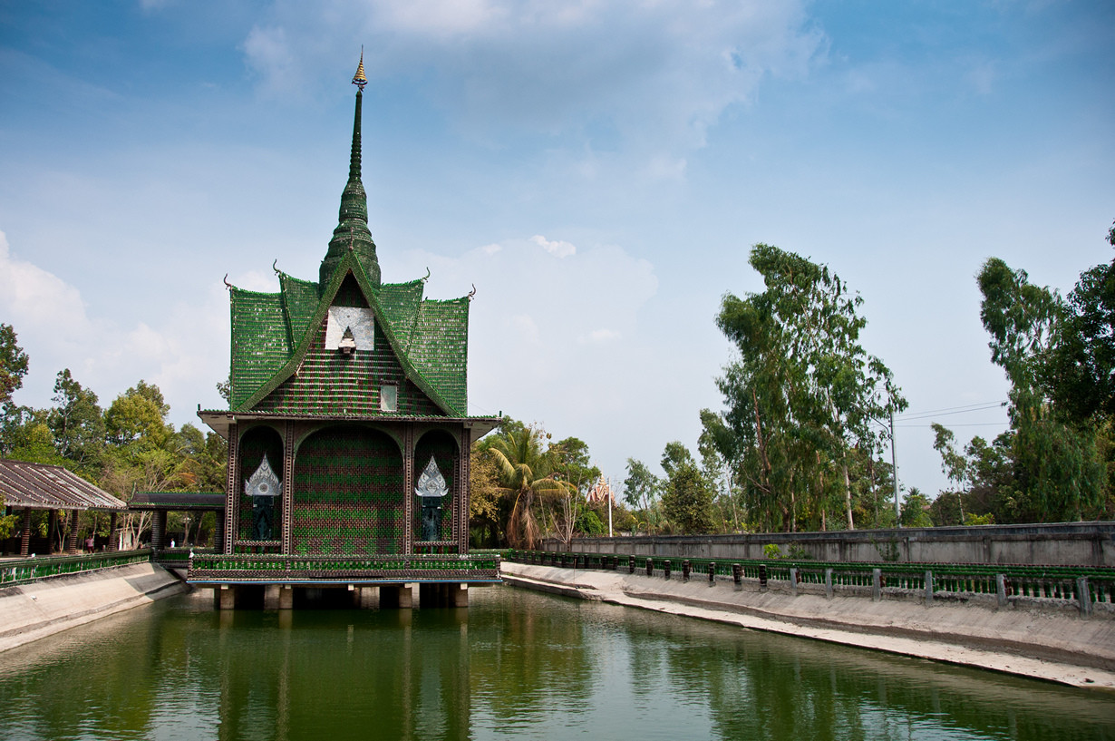 The main building at Wat Pa Maha Chedio Kaew, more commonly know as "The Million Bottle Temple" or "Wat Lan Kuad" in Thai. This Buddhist temple about 300 miles from Bangkok is decorated with more than a million recycled bottles.